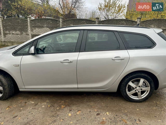 Серый Опель Астра, объемом двигателя 1.69 л и пробегом 239 тыс. км за 5700 $, фото 7 на Automoto.ua