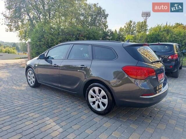 Серый Опель Астра, объемом двигателя 1.6 л и пробегом 240 тыс. км за 8650 $, фото 7 на Automoto.ua
