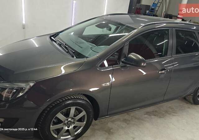 Сірий Опель Астра, об'ємом двигуна 1.6 л та пробігом 182 тис. км за 8999 $, фото 1 на Automoto.ua