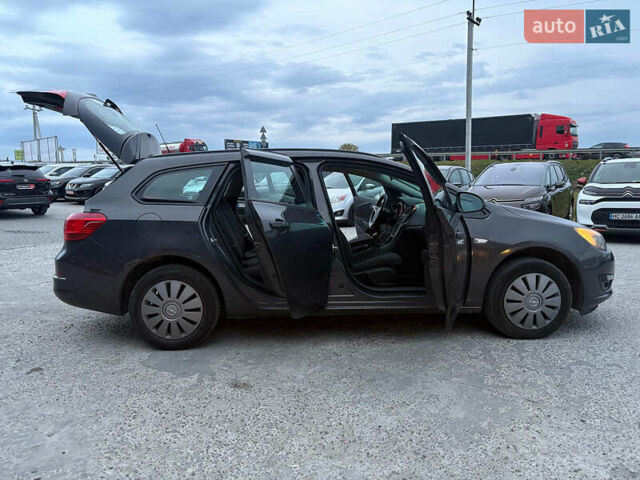 Серый Опель Астра, объемом двигателя 1.7 л и пробегом 210 тыс. км за 7990 $, фото 5 на Automoto.ua