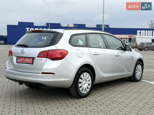 Серый Опель Астра, объемом двигателя 1.6 л и пробегом 242 тыс. км за 8800 $, фото 11 на Automoto.ua