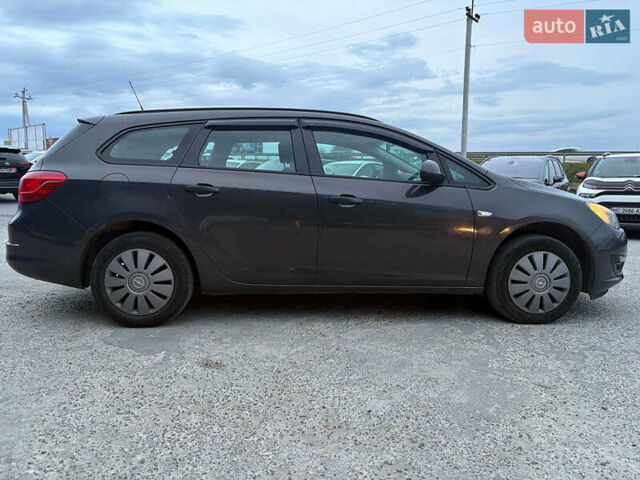 Серый Опель Астра, объемом двигателя 1.7 л и пробегом 210 тыс. км за 7990 $, фото 2 на Automoto.ua