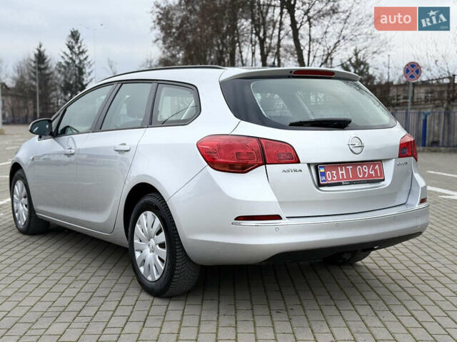 Серый Опель Астра, объемом двигателя 1.6 л и пробегом 242 тыс. км за 8800 $, фото 7 на Automoto.ua