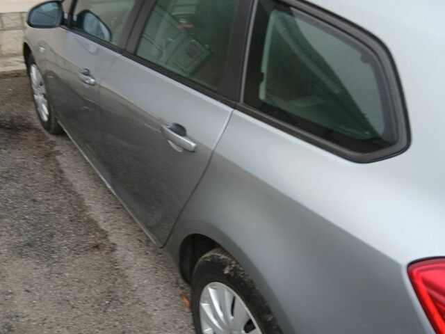 Серый Опель Астра, объемом двигателя 1.6 л и пробегом 198 тыс. км за 8650 $, фото 4 на Automoto.ua