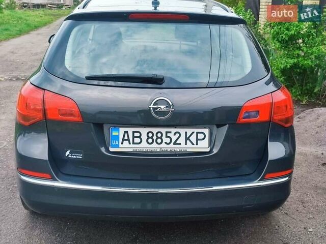 Серый Опель Астра, объемом двигателя 1.6 л и пробегом 208 тыс. км за 8000 $, фото 6 на Automoto.ua