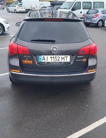 Серый Опель Астра, объемом двигателя 1.6 л и пробегом 230 тыс. км за 8600 $, фото 4 на Automoto.ua