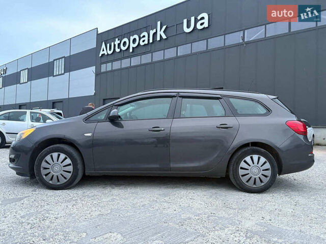 Серый Опель Астра, объемом двигателя 1.7 л и пробегом 210 тыс. км за 7990 $, фото 1 на Automoto.ua