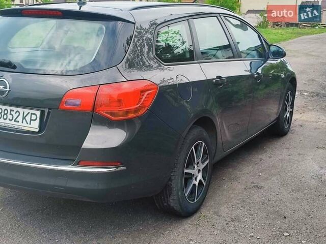 Серый Опель Астра, объемом двигателя 1.6 л и пробегом 208 тыс. км за 8000 $, фото 4 на Automoto.ua