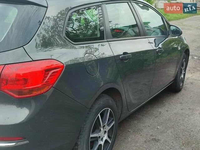 Серый Опель Астра, объемом двигателя 1.6 л и пробегом 208 тыс. км за 8000 $, фото 11 на Automoto.ua