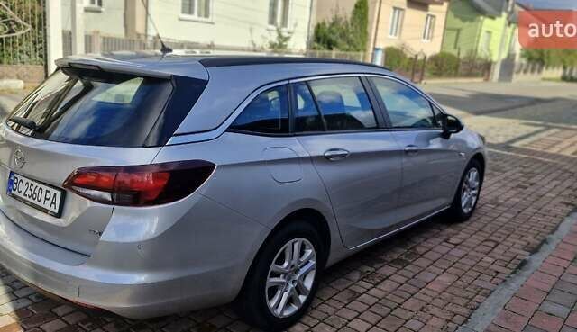 Серый Опель Астра, объемом двигателя 1.6 л и пробегом 295 тыс. км за 8999 $, фото 7 на Automoto.ua