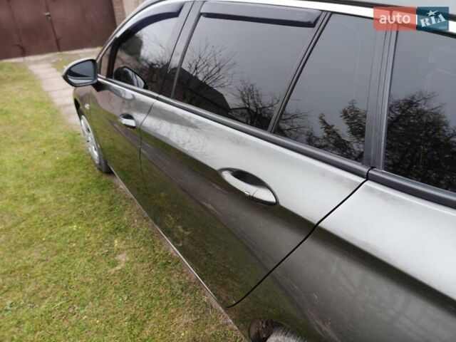 Серый Опель Астра, объемом двигателя 1.6 л и пробегом 283 тыс. км за 11499 $, фото 11 на Automoto.ua