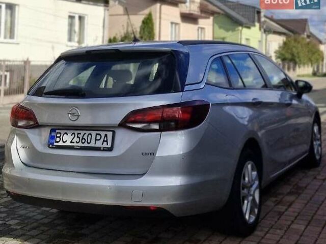 Серый Опель Астра, объемом двигателя 1.6 л и пробегом 295 тыс. км за 8999 $, фото 4 на Automoto.ua