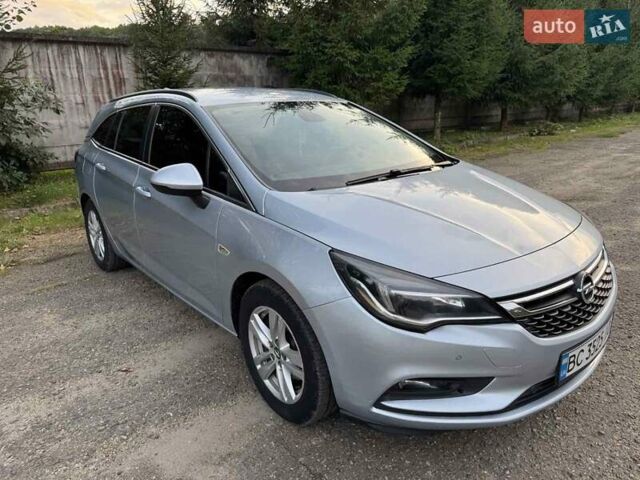Серый Опель Астра, объемом двигателя 1.6 л и пробегом 249 тыс. км за 9000 $, фото 7 на Automoto.ua