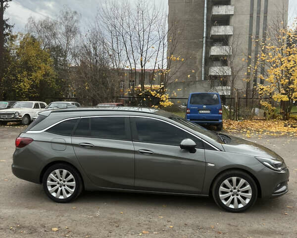 Серый Опель Астра, объемом двигателя 1.6 л и пробегом 198 тыс. км за 10700 $, фото 3 на Automoto.ua