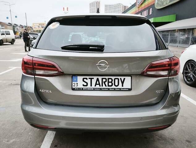 Серый Опель Астра, объемом двигателя 1.6 л и пробегом 258 тыс. км за 11200 $, фото 2 на Automoto.ua