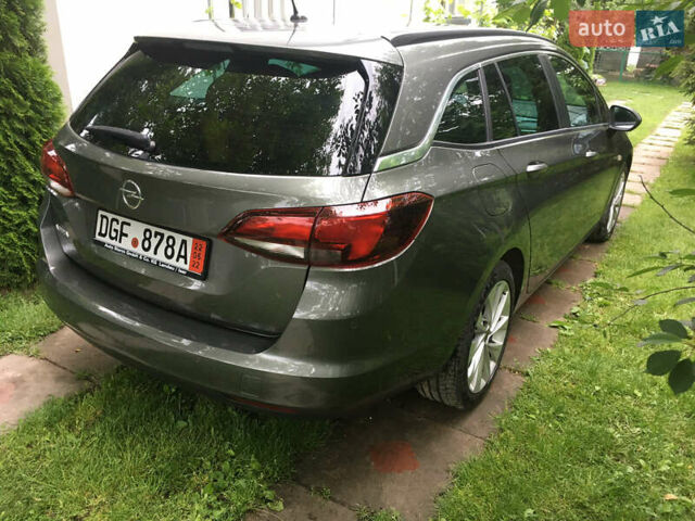 Сірий Опель Астра, об'ємом двигуна 1.6 л та пробігом 242 тис. км за 9999 $, фото 3 на Automoto.ua