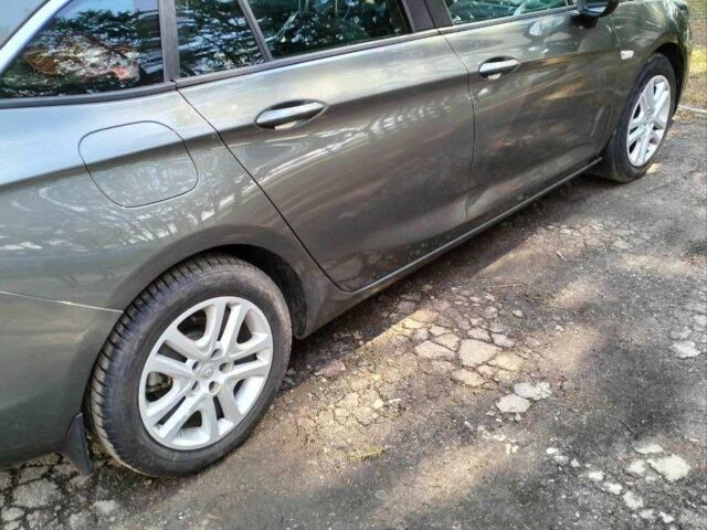 Серый Опель Астра, объемом двигателя 1.6 л и пробегом 230 тыс. км за 11200 $, фото 1 на Automoto.ua