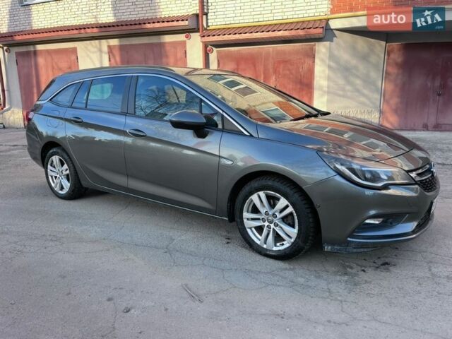 Серый Опель Астра, объемом двигателя 1.6 л и пробегом 216 тыс. км за 9500 $, фото 3 на Automoto.ua