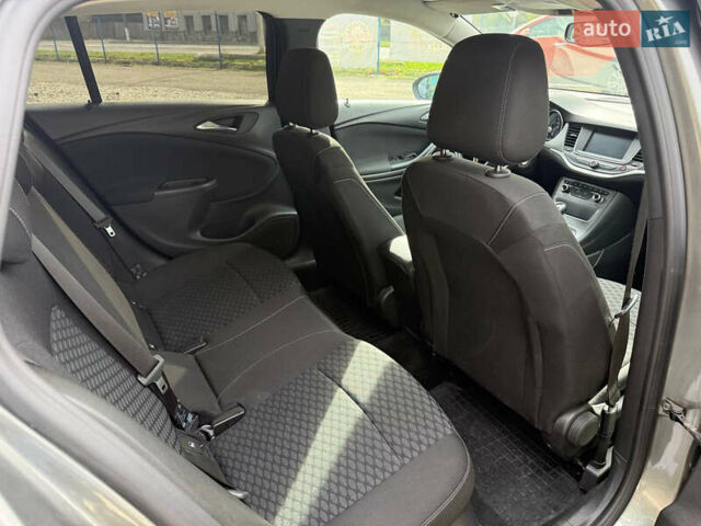 Серый Опель Астра, объемом двигателя 1.6 л и пробегом 201 тыс. км за 10999 $, фото 27 на Automoto.ua