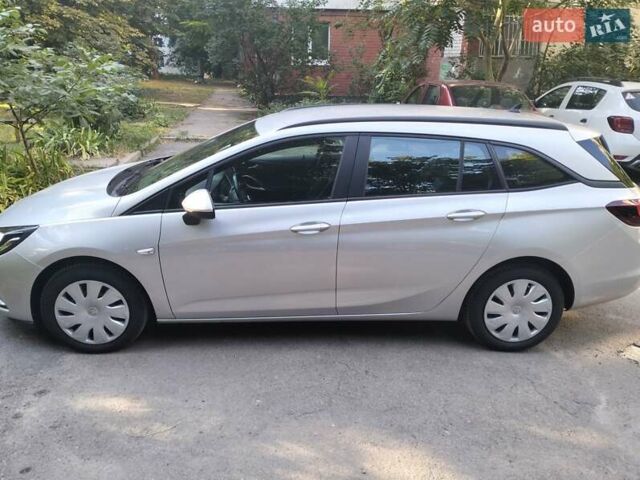 Серый Опель Астра, объемом двигателя 1.6 л и пробегом 336 тыс. км за 10000 $, фото 7 на Automoto.ua