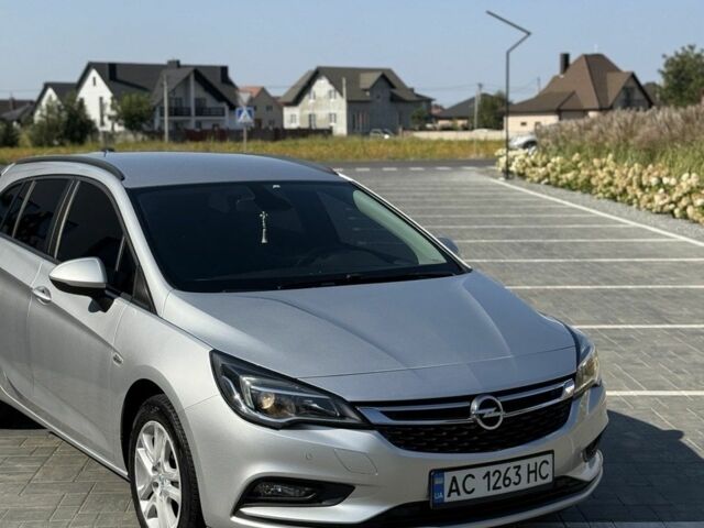 Серый Опель Астра, объемом двигателя 1.6 л и пробегом 255 тыс. км за 9800 $, фото 2 на Automoto.ua