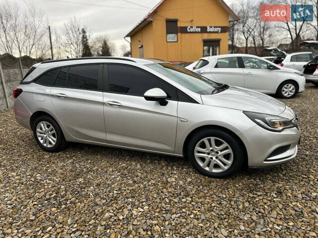 Серый Опель Астра, объемом двигателя 1.6 л и пробегом 127 тыс. км за 9699 $, фото 11 на Automoto.ua