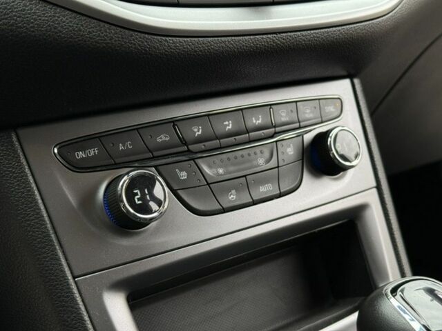 Серый Опель Астра, объемом двигателя 1.6 л и пробегом 157 тыс. км за 12199 $, фото 14 на Automoto.ua