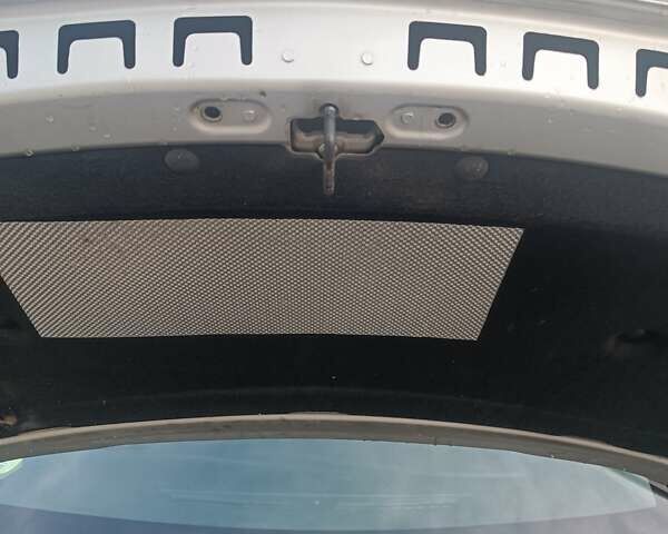 Серый Опель Астра, объемом двигателя 1.6 л и пробегом 256 тыс. км за 11999 $, фото 19 на Automoto.ua