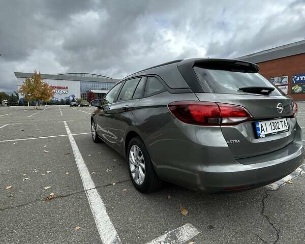 Сірий Опель Астра, об'ємом двигуна 1.6 л та пробігом 218 тис. км за 11000 $, фото 6 на Automoto.ua