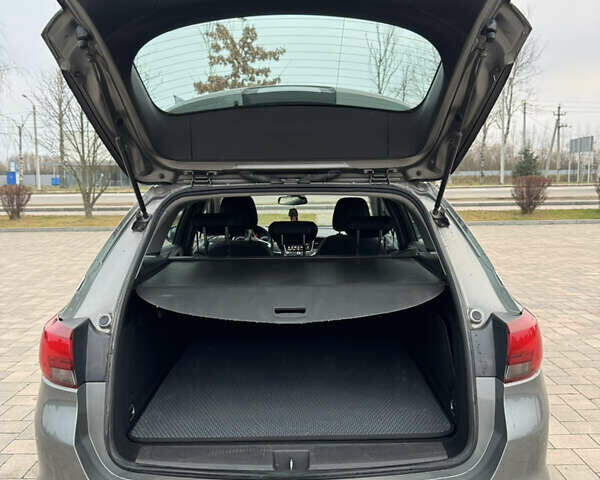 Серый Опель Астра, объемом двигателя 1.6 л и пробегом 209 тыс. км за 10999 $, фото 26 на Automoto.ua