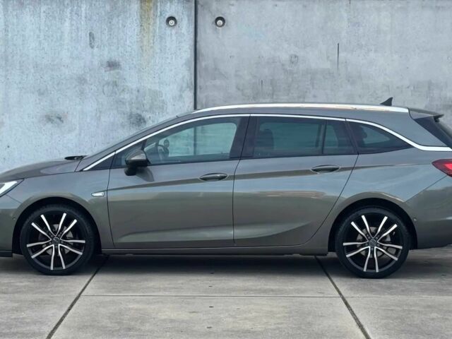 Серый Опель Астра, объемом двигателя 1.4 л и пробегом 39 тыс. км за 12450 $, фото 3 на Automoto.ua