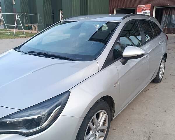 Серый Опель Астра, объемом двигателя 1.6 л и пробегом 256 тыс. км за 11999 $, фото 4 на Automoto.ua