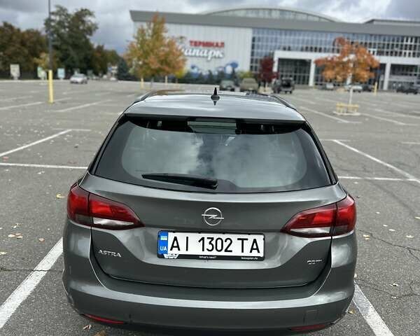Сірий Опель Астра, об'ємом двигуна 1.6 л та пробігом 218 тис. км за 11000 $, фото 5 на Automoto.ua