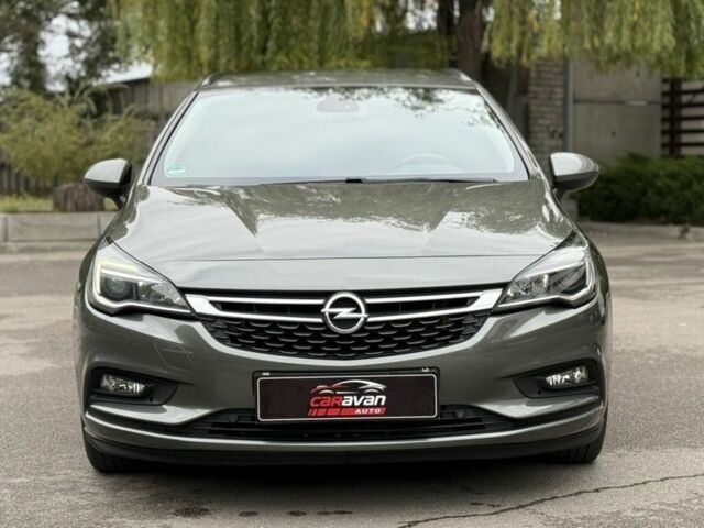 Серый Опель Астра, объемом двигателя 1.6 л и пробегом 157 тыс. км за 12199 $, фото 2 на Automoto.ua