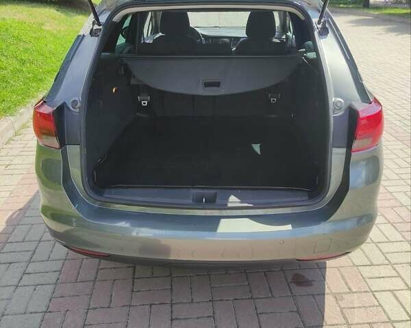 Сірий Опель Астра, об'ємом двигуна 1.6 л та пробігом 158 тис. км за 11900 $, фото 4 на Automoto.ua