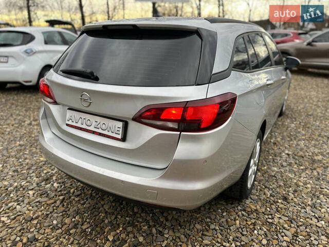 Серый Опель Астра, объемом двигателя 1.6 л и пробегом 127 тыс. км за 9699 $, фото 6 на Automoto.ua