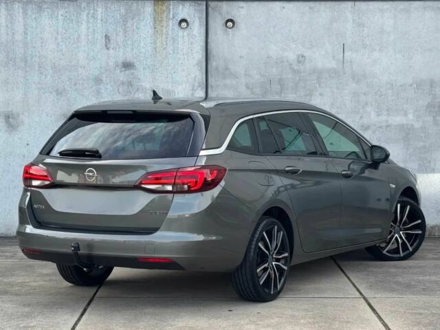 Серый Опель Астра, объемом двигателя 1.4 л и пробегом 39 тыс. км за 12450 $, фото 6 на Automoto.ua