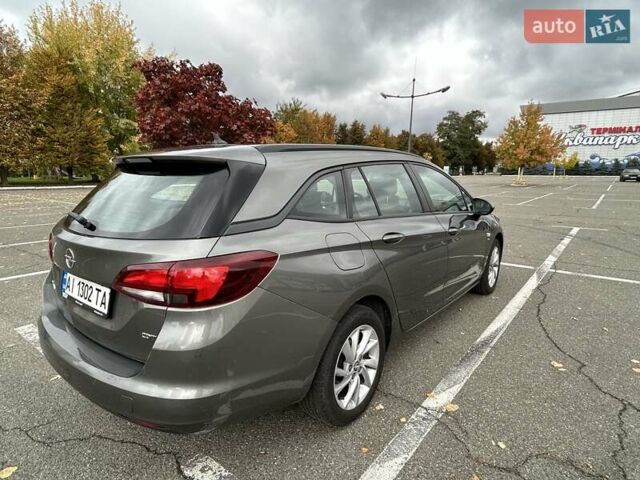 Сірий Опель Астра, об'ємом двигуна 1.6 л та пробігом 218 тис. км за 11000 $, фото 25 на Automoto.ua