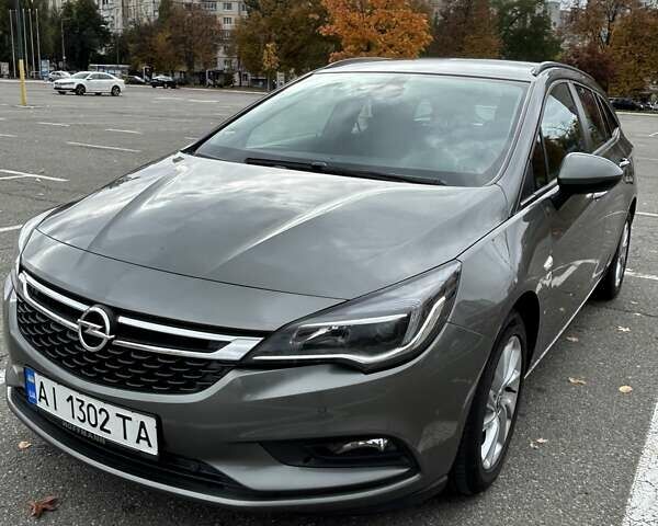 Сірий Опель Астра, об'ємом двигуна 1.6 л та пробігом 218 тис. км за 11000 $, фото 23 на Automoto.ua