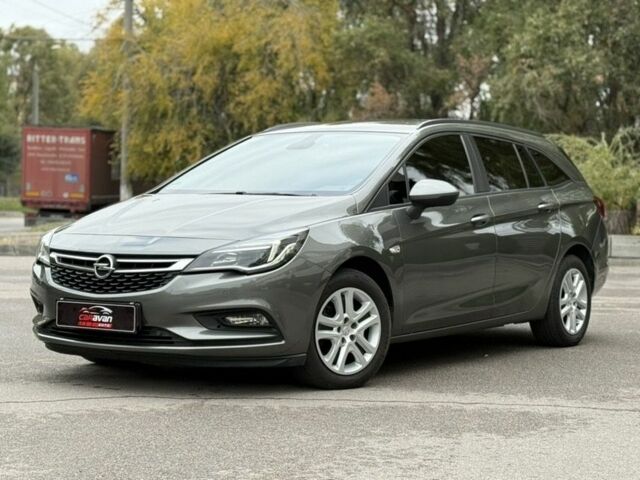 Серый Опель Астра, объемом двигателя 1.6 л и пробегом 157 тыс. км за 12199 $, фото 3 на Automoto.ua