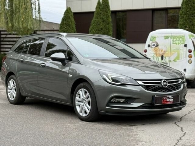Серый Опель Астра, объемом двигателя 1.6 л и пробегом 157 тыс. км за 12199 $, фото 1 на Automoto.ua