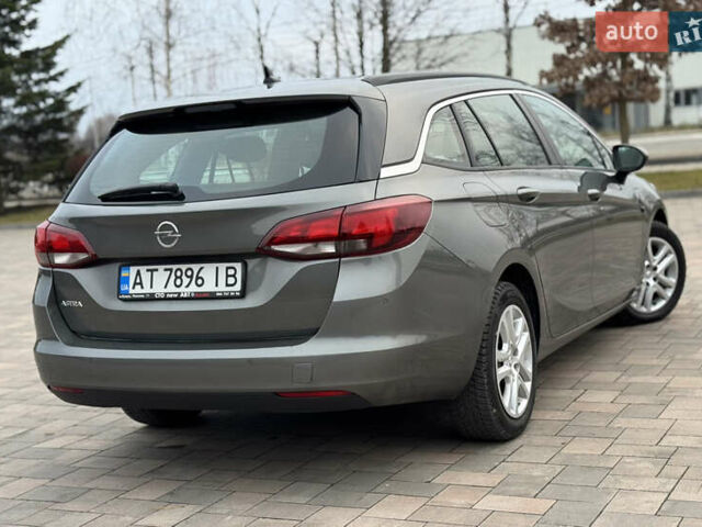 Серый Опель Астра, объемом двигателя 1.6 л и пробегом 209 тыс. км за 10999 $, фото 4 на Automoto.ua