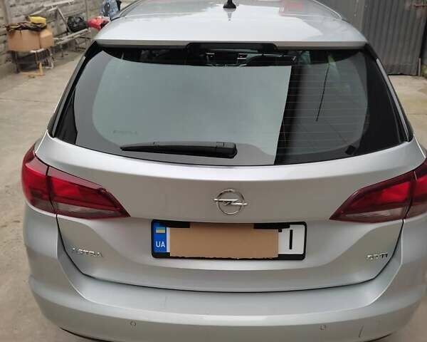 Серый Опель Астра, объемом двигателя 1.6 л и пробегом 261 тыс. км за 12300 $, фото 4 на Automoto.ua