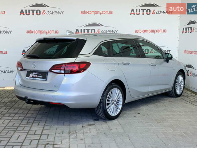 Серый Опель Астра, объемом двигателя 1.6 л и пробегом 187 тыс. км за 13450 $, фото 2 на Automoto.ua