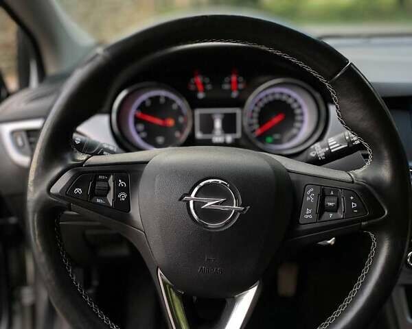 Серый Опель Астра, объемом двигателя 1.5 л и пробегом 115 тыс. км за 12599 $, фото 11 на Automoto.ua