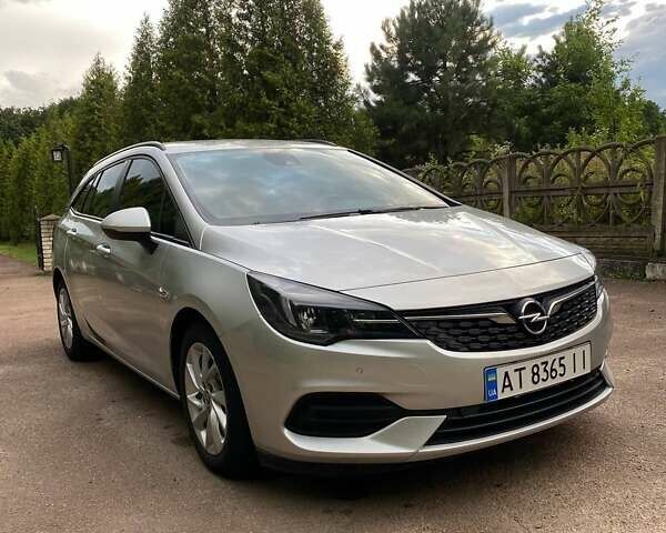 Серый Опель Астра, объемом двигателя 1.5 л и пробегом 115 тыс. км за 12599 $, фото 5 на Automoto.ua