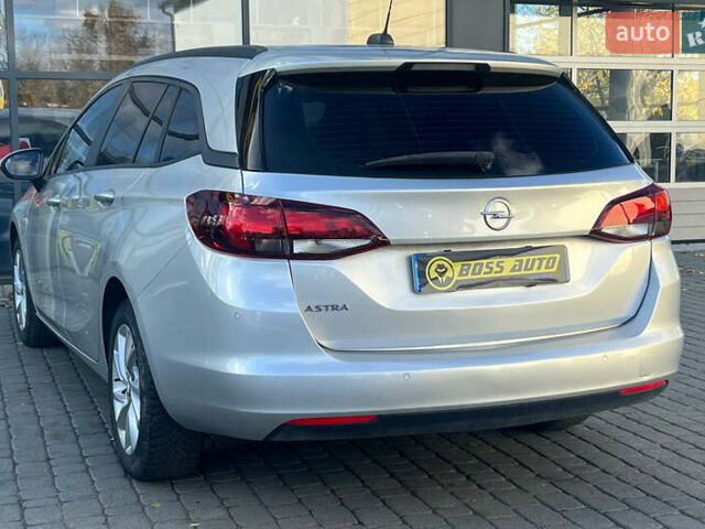 Серый Опель Астра, объемом двигателя 1.5 л и пробегом 110 тыс. км за 13000 $, фото 4 на Automoto.ua