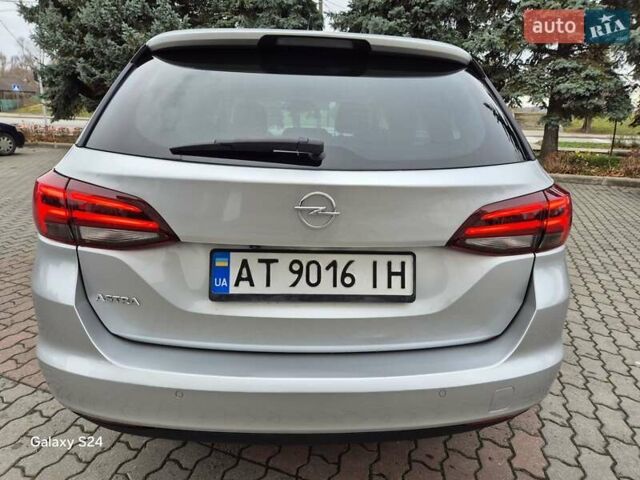 Сірий Опель Астра, об'ємом двигуна 1.5 л та пробігом 142 тис. км за 13700 $, фото 6 на Automoto.ua