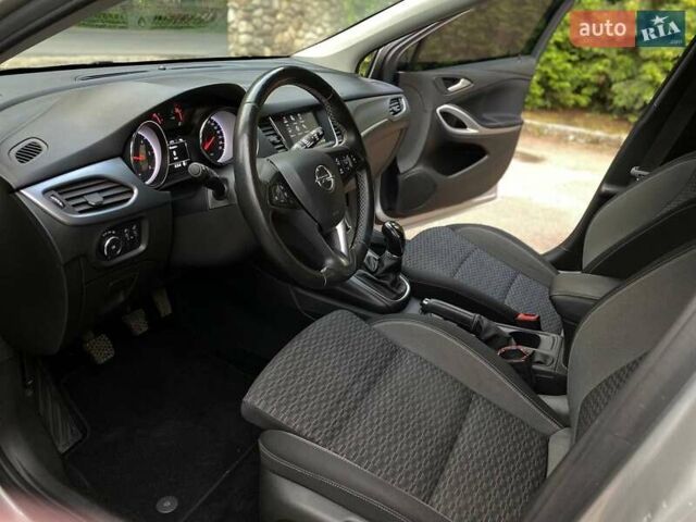 Серый Опель Астра, объемом двигателя 1.5 л и пробегом 115 тыс. км за 12599 $, фото 12 на Automoto.ua