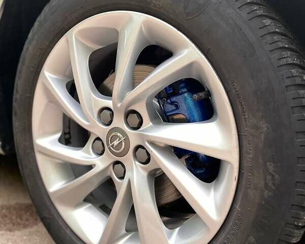 Серый Опель Астра, объемом двигателя 1.5 л и пробегом 115 тыс. км за 12599 $, фото 37 на Automoto.ua